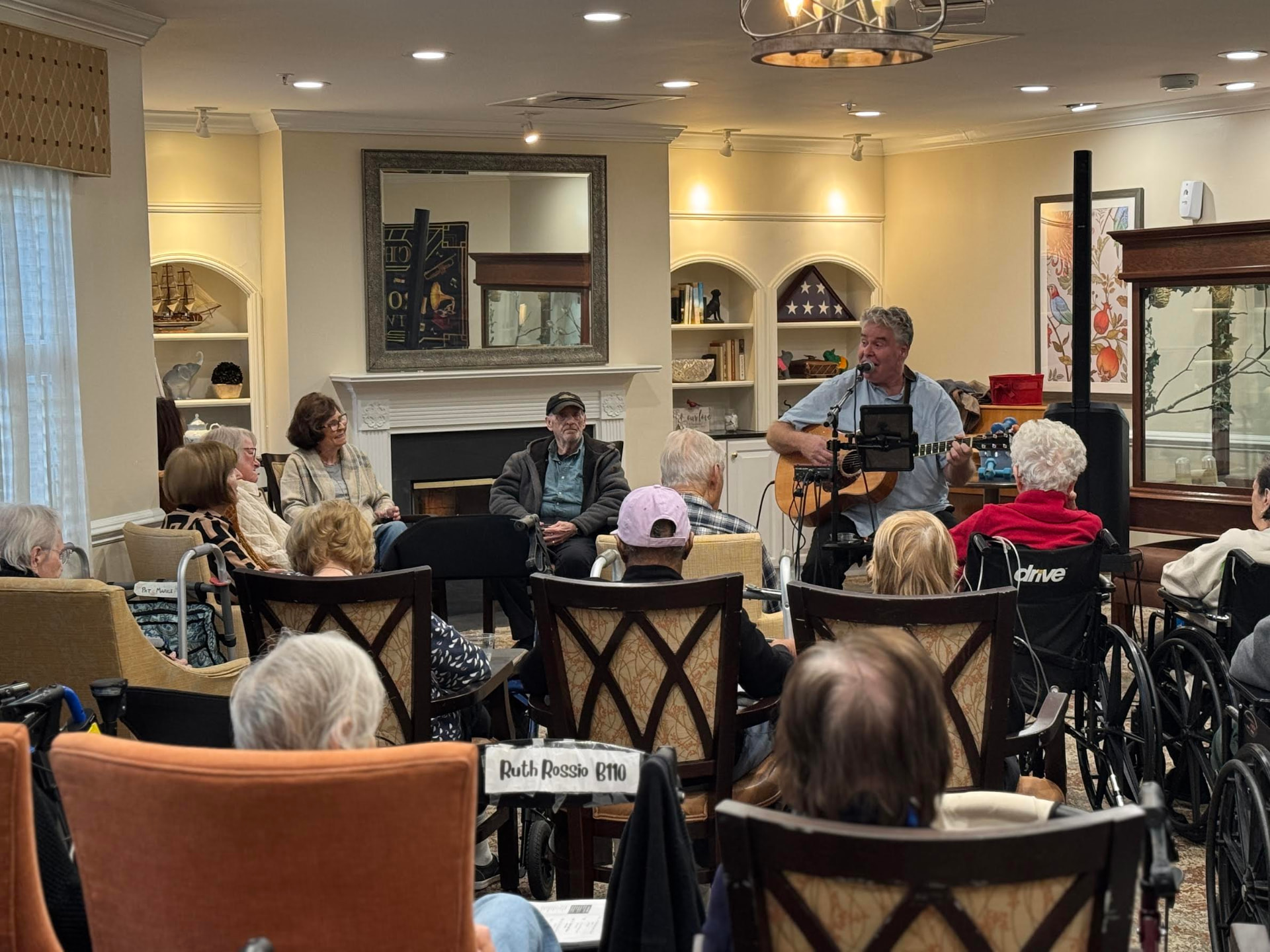 An afternoon performance in a community living room